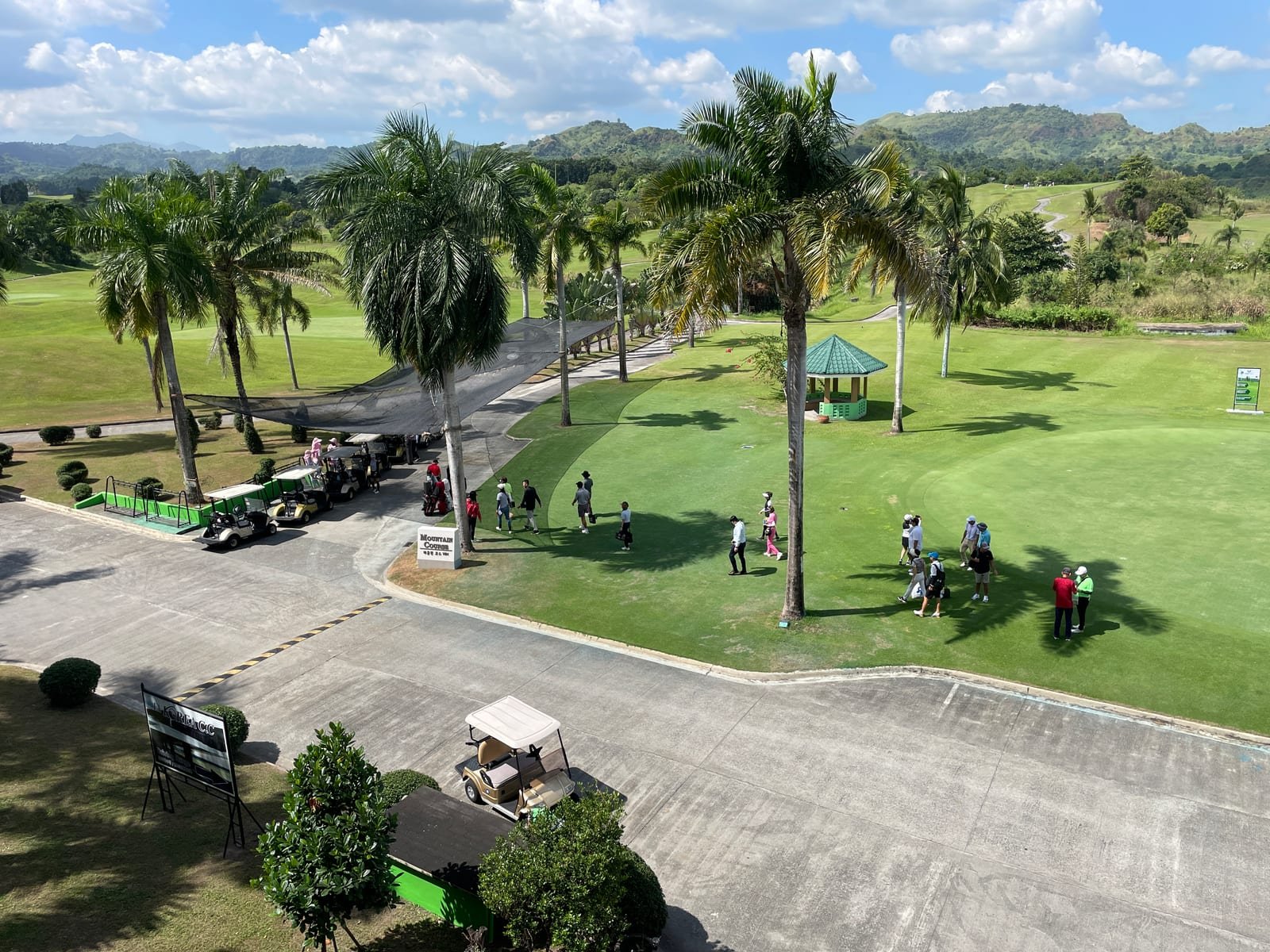 Golfers heading out on a course near Clark
