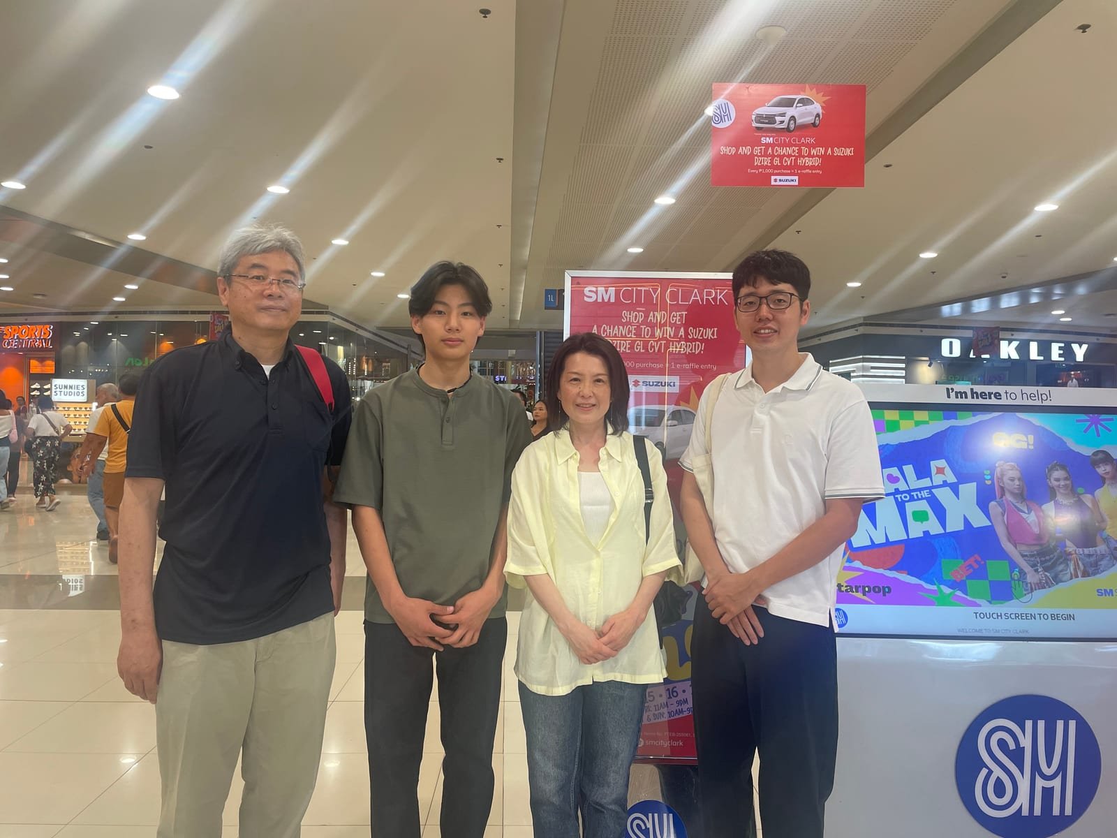 At SM City Clark with staff and other students