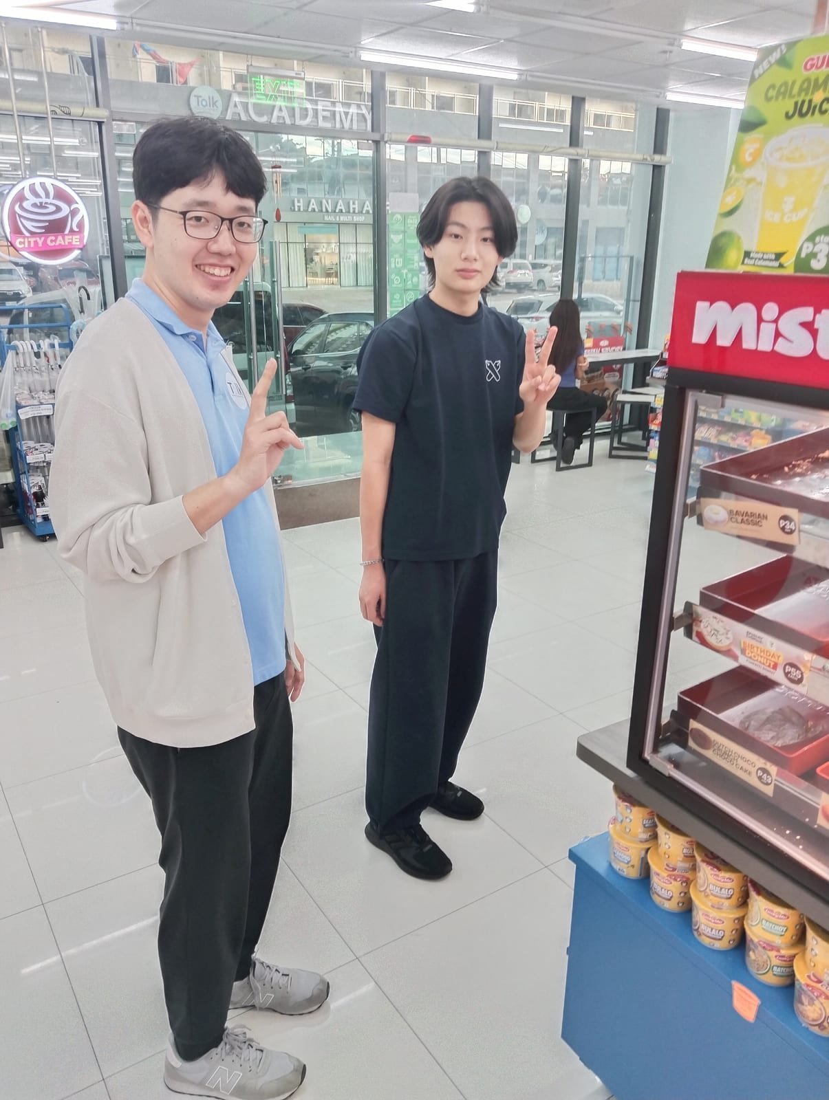 With a staff member outside the campus store