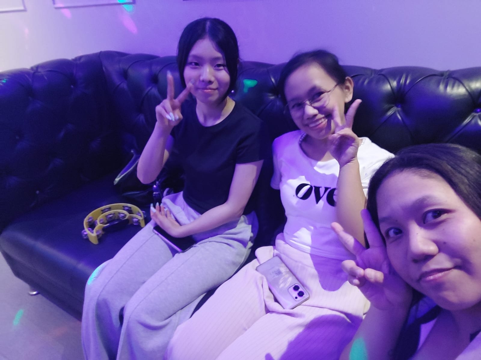 In a karaoke room with teachers and friends