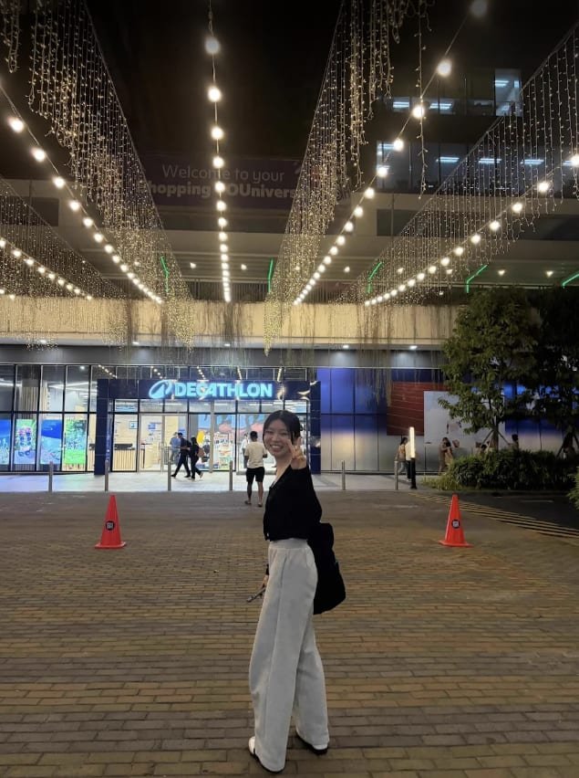 The exterior of a shopping mall at night
